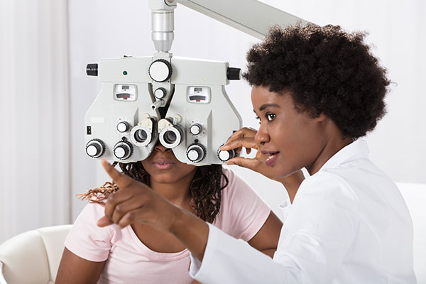 optician during an eye teat